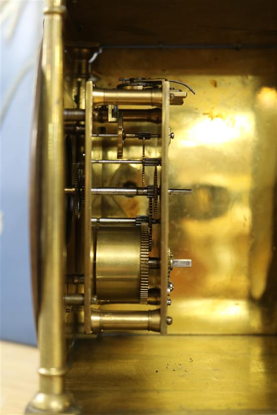 A lantern clock with later movement
